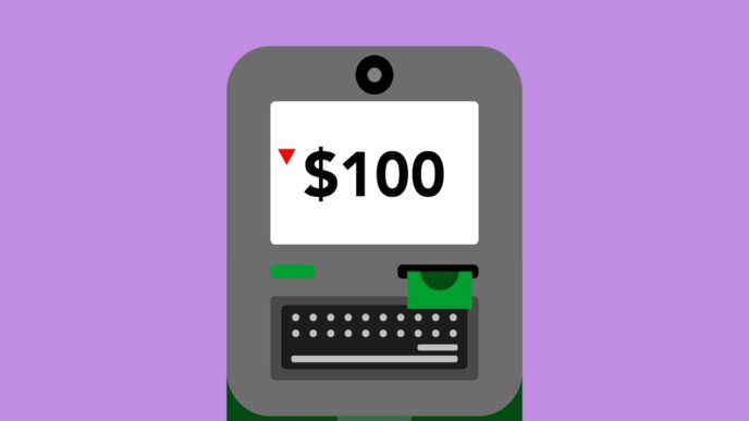 Person using an ATM machine to withdraw cash fee-free