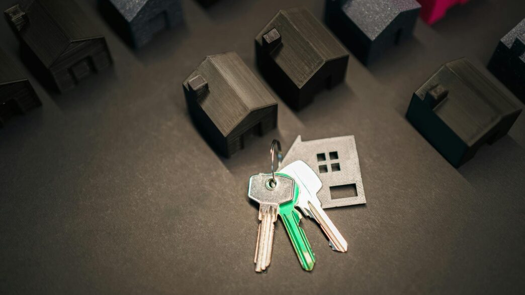 House keys resting on mortgage paperwork, illustrating biweekly mortgage payment strategy