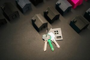 House keys resting on mortgage paperwork, illustrating biweekly mortgage payment strategy