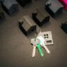 House keys resting on mortgage paperwork, illustrating biweekly mortgage payment strategy