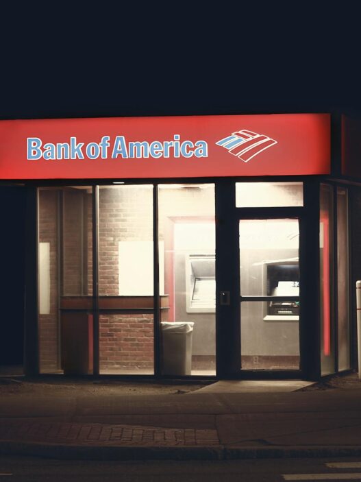 Customer at a bank branch counter using free in-branch banking services