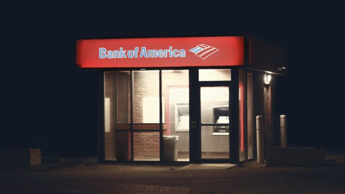 Customer at a bank branch counter using free in-branch banking services
