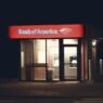 Customer at a bank branch counter using free in-branch banking services