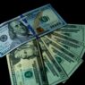 Stacks of US dollar bills representing cash bonuses paid by banks for opening new checking accounts