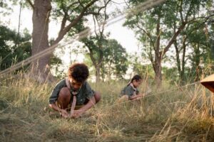 Kids playing outdoors at a summer day camp