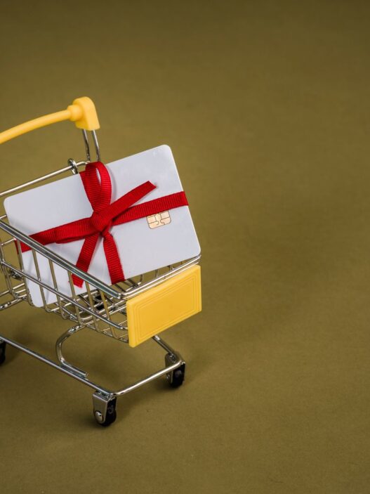Gift cards fanned out, illustrating how buying discounted gift cards saves money on everyday spending