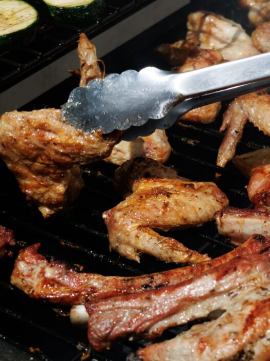 Backyard barbecue grill with food at a summer cookout