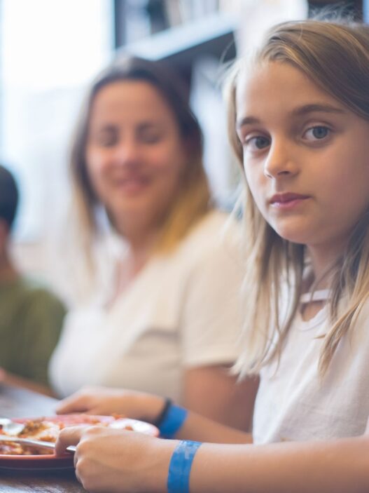 Family with children eating a meal at a restaurant