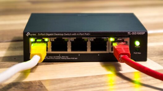 A home Wi-Fi router on a desk, illustrating how to lower your monthly internet bill in 2026.