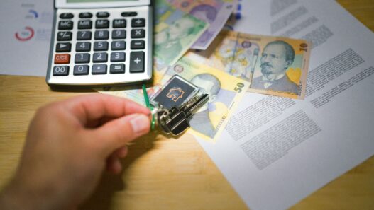 Apartment keys and a lease document on a table, illustrating how to negotiate your rent in 2026.