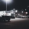 Rows of used cars on a dealership lot in 2026