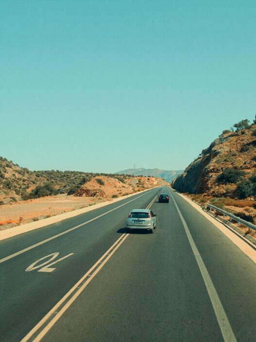 Car on an open highway during a summer road trip