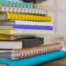 Back-to-school supplies and notebooks representing tax-free weekend shopping savings