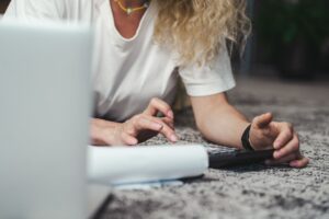Freelancer reviewing finances and budgeting at a laptop