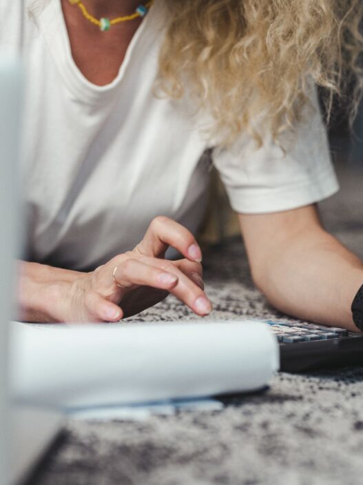 Freelancer reviewing finances and budgeting at a laptop
