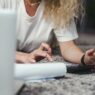 Freelancer reviewing finances and budgeting at a laptop