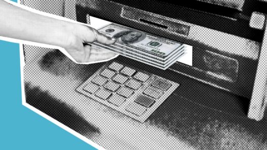 A person withdrawing cash from an ATM machine
