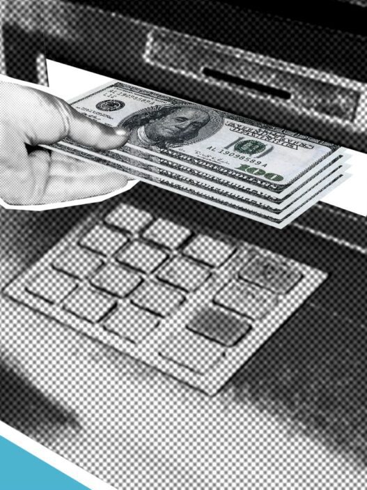 A person withdrawing cash from an ATM machine