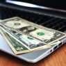 Person reviewing automatic bill payments on a laptop