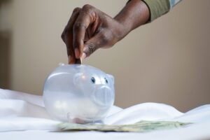 Certificate of deposit paperwork and savings account statement on a desk