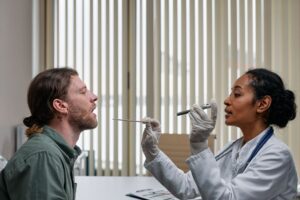 A patient meeting with a doctor for a routine preventive care visit