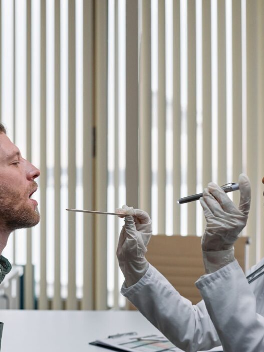A patient meeting with a doctor for a routine preventive care visit