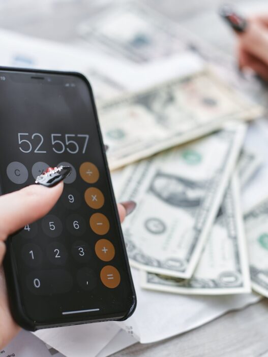 Person reviewing a cell phone bill on a smartphone