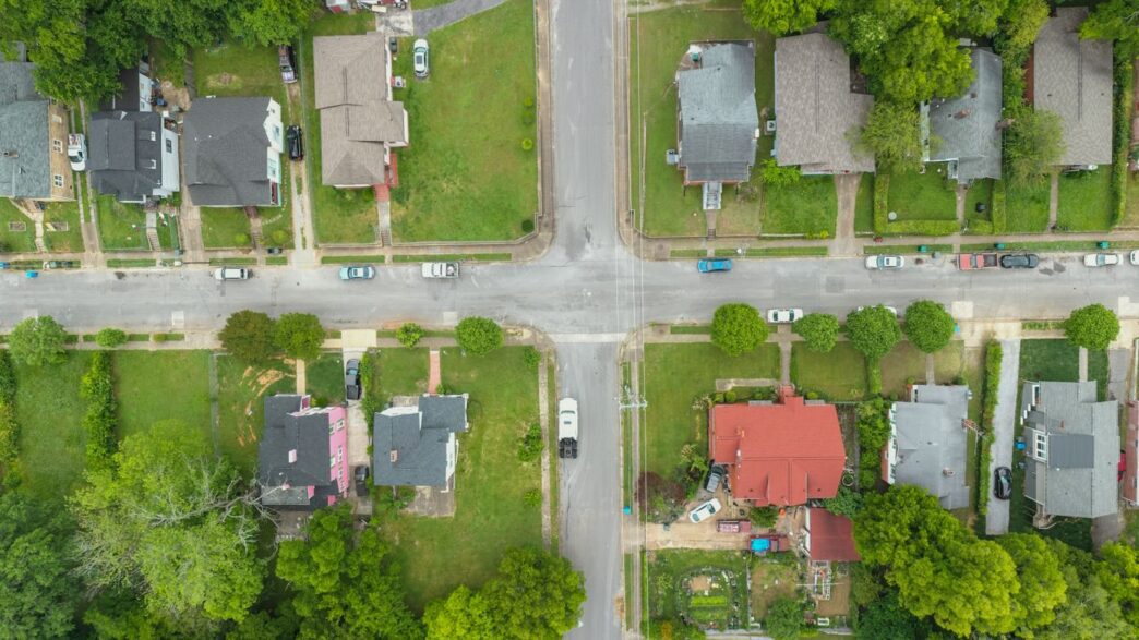 Row of suburban single-family homes representing property tax assessments