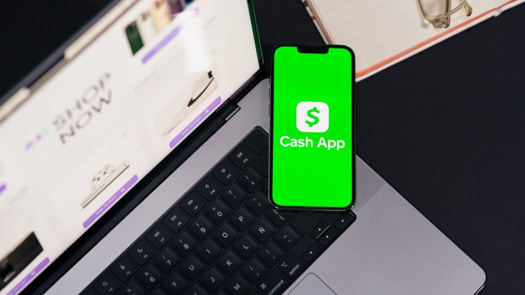 Person moving money between bank accounts on a phone