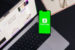 Person moving money between bank accounts on a phone