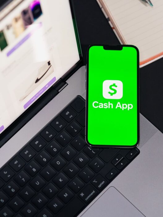 Person moving money between bank accounts on a phone