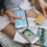 Credit cards and a smartphone on a table, used to check rewards balances