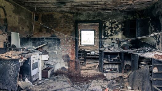 Water damage on a home ceiling, illustrating how a claim lands on a CLUE report for seven years