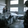 A vehicle being repaired in a body shop, illustrating the basis for a diminished value claim