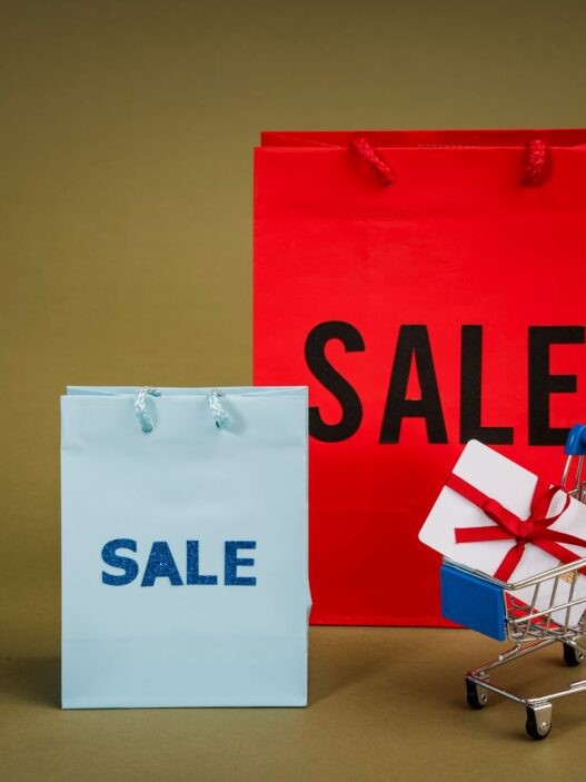 Shopper carrying holiday gift bags