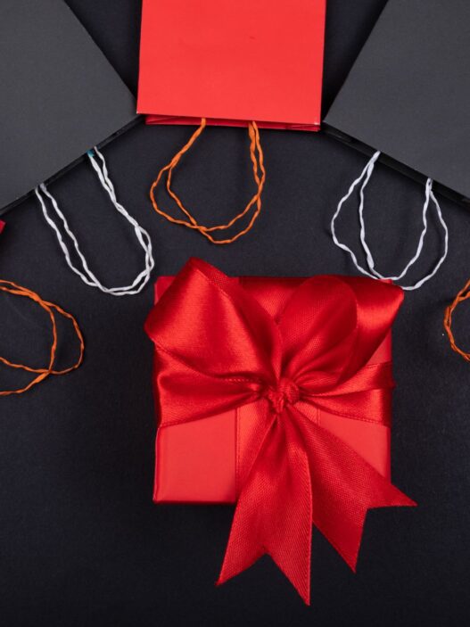 Wrapped holiday gifts and shopping bags set aside weeks before Christmas