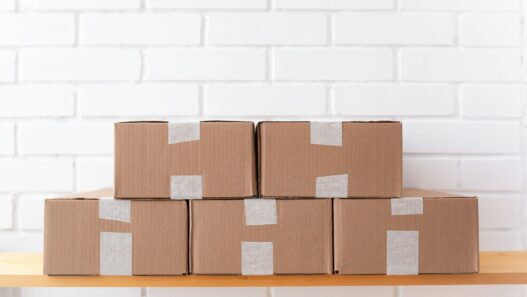 Cardboard shipping boxes and packing supplies ready to mail