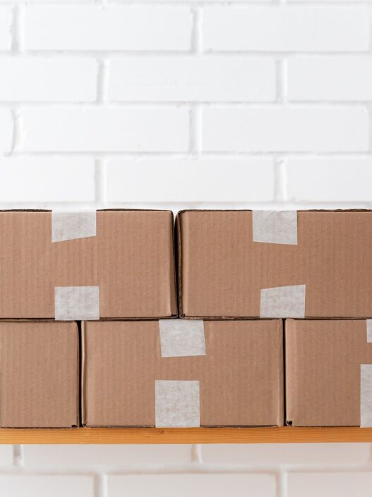 Cardboard shipping boxes and packing supplies ready to mail