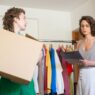 Folded secondhand clothing packed in a box ready to sell online
