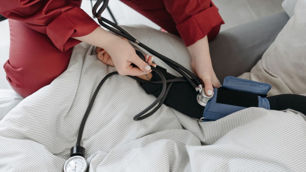 Doctor examining a patient at an urgent care clinic