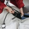 Doctor examining a patient at an urgent care clinic