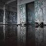 Standing water in a residential basement, illustrating why water backup coverage limits matter