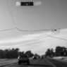 A cracked vehicle windshield, illustrating windshield insurance claim costs including ADAS recalibration