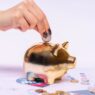 Piggy bank and calendar representing a savings account promotional rate deadline