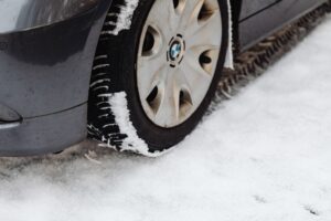 Car with winter tires on a snowy road