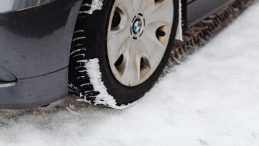 Car with winter tires on a snowy road