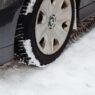 Car with winter tires on a snowy road