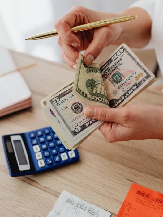 Monthly budget planner notebook with a calculator for a zero-based budget
