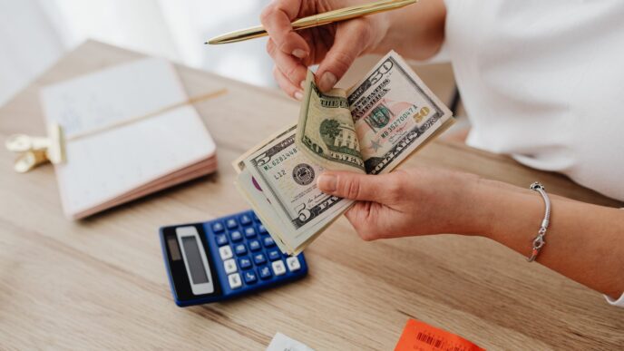 Monthly budget planner notebook with a calculator for a zero-based budget