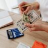 Monthly budget planner notebook with a calculator for a zero-based budget